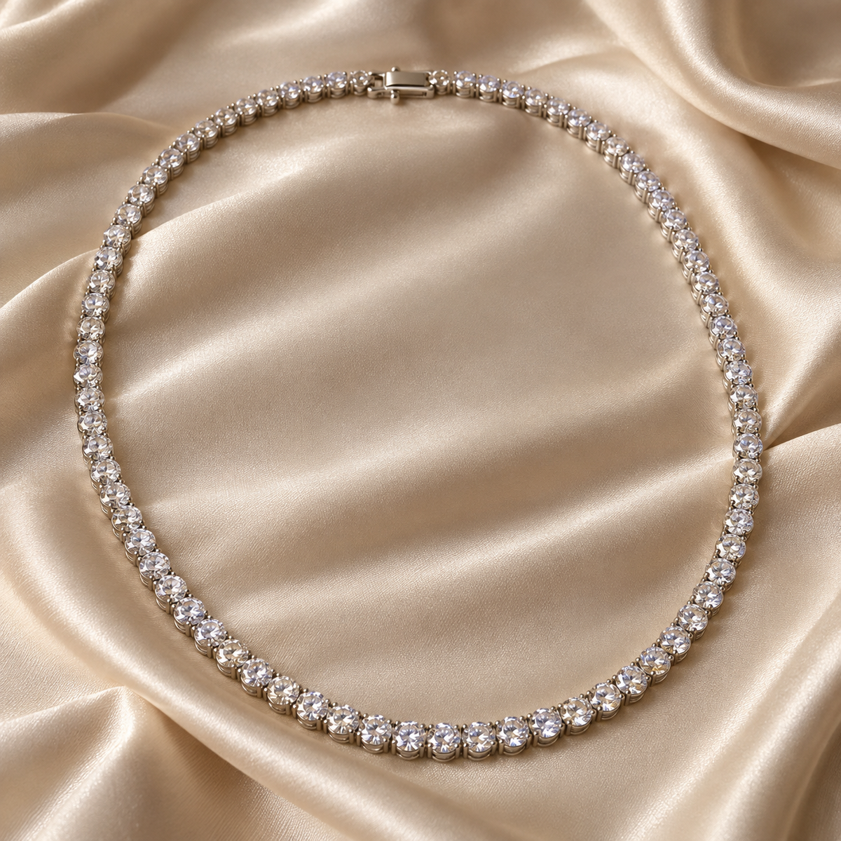 eeablish® Lumière Tennis Necklace on champagne satin